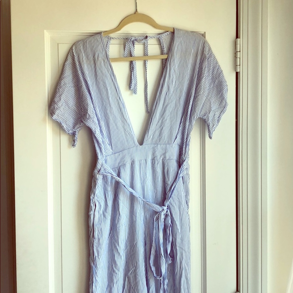 Deep V Romper (worn once) Size small